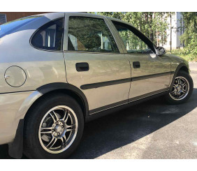 Накладки на арки (4 шт, чорні) ABS пластик для Opel Vectra B 1995-2002 рр