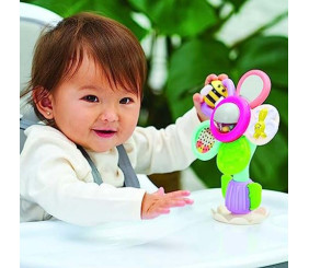 Розвиваюча іграшка на присосці INFANTINO Чарівна квітка